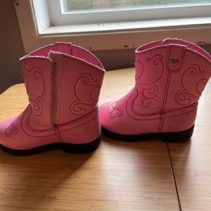 Pink cowboy boot.